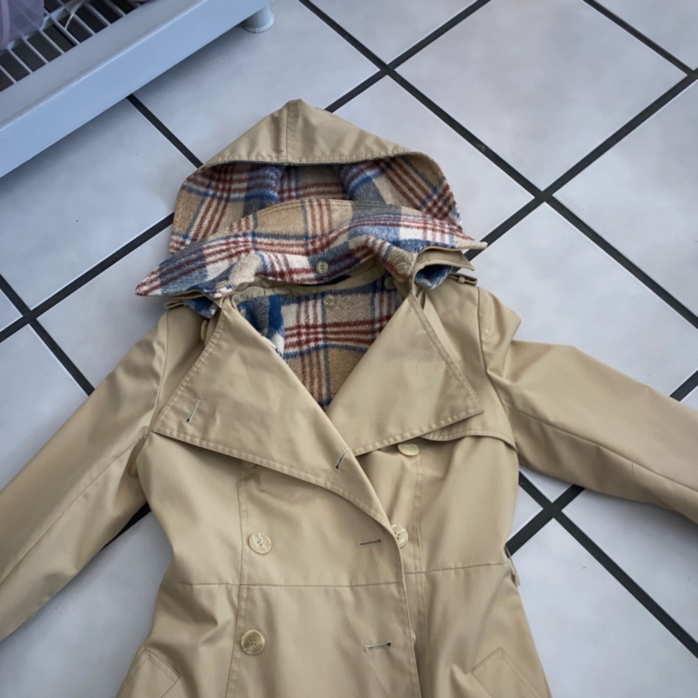 Tan jacket with lining and hood. Sleeve length 20” length 39”.